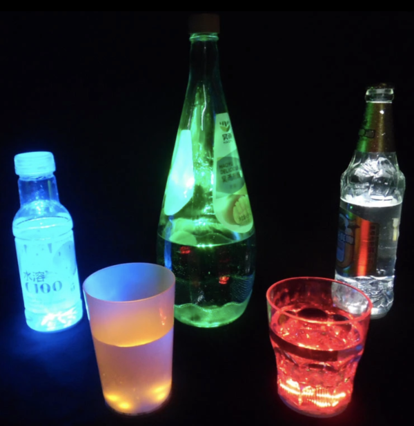 Glowing stand for glasses, bottles, dishes